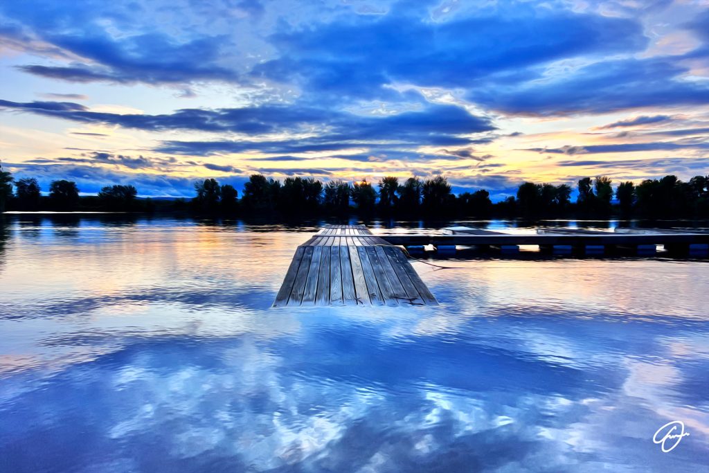 Leap of Faith artwork by Fabio Dal Boni – sunset over a lake in Massachusetts with wooden pier and blue sky reflections